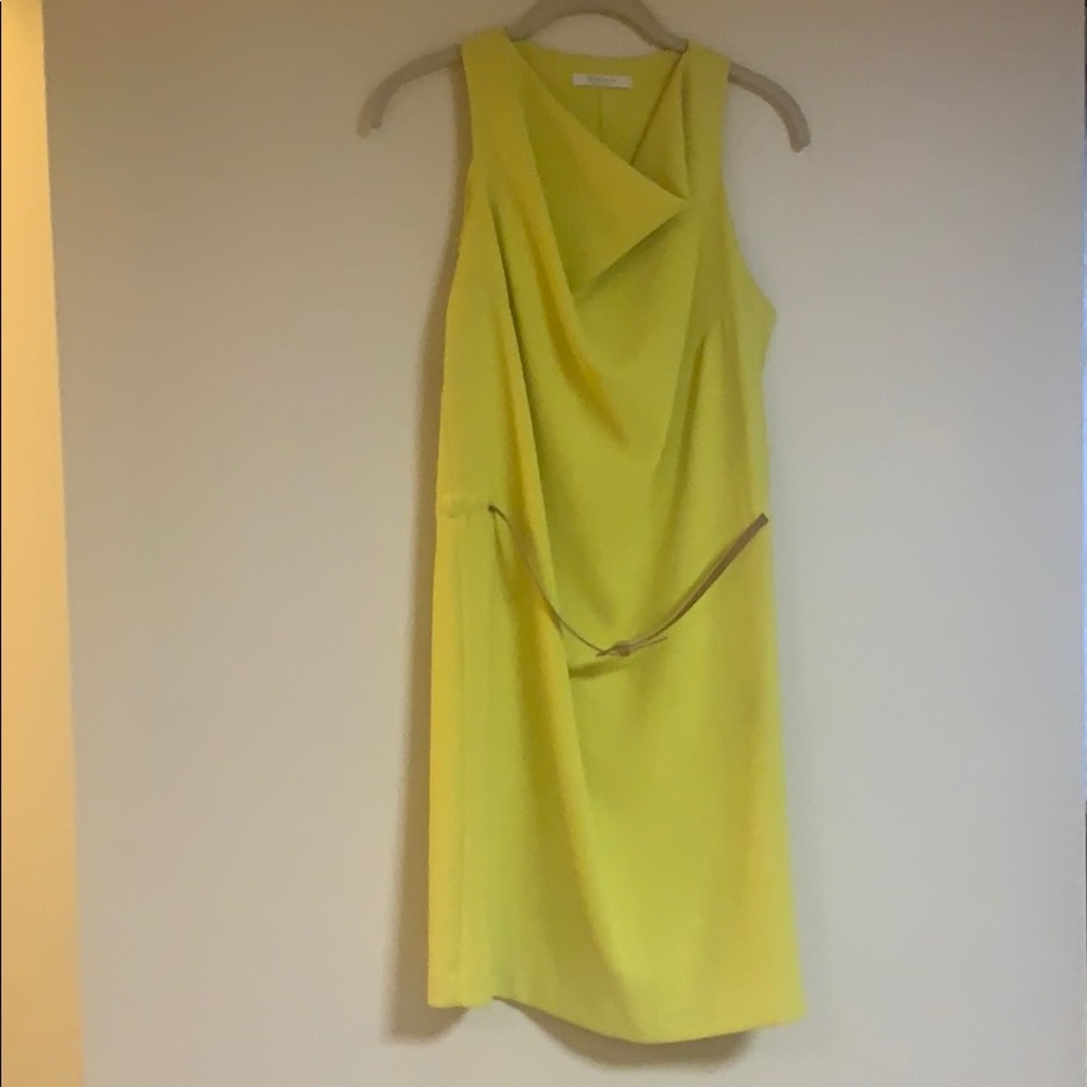 Elegant chartreuse sleeveless dress.